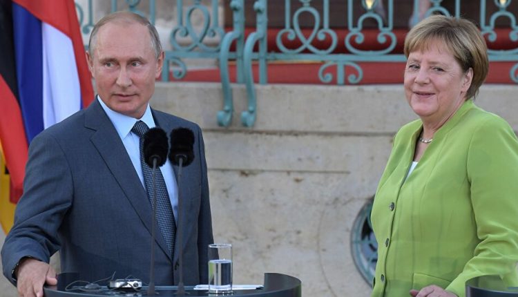 الرئيس الروسي فلاديمير بوتين والمستشارة الألمانية أنغيلا ميركل